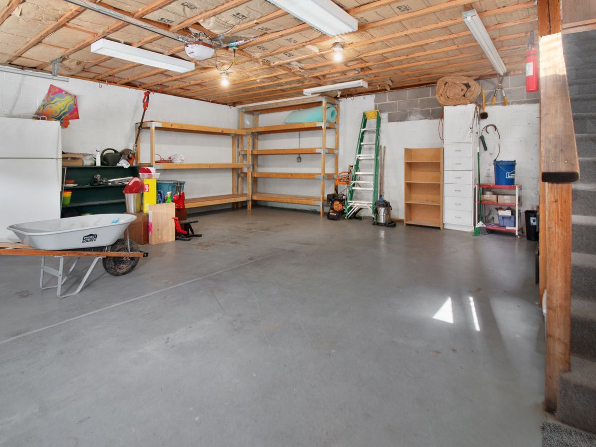 A tidy garage with a clear floor after a cleanout